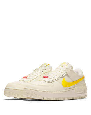 nike air force 1 trainers in white and yellow