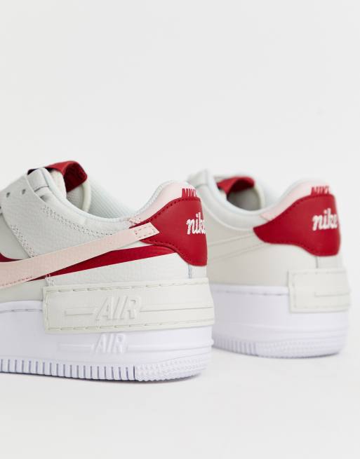 Nike Air Force 1 Shadow trainers in off white and pink