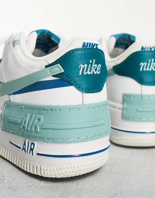 Nike Air Force 1 Shadow trainers in white and blue