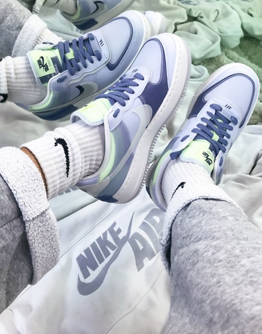 Nike Air Force 1 Shadow trainers in white and blue