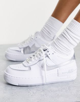 Nike Air Force 1 Shadow trainers in white and silver