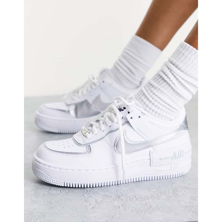 Nike Air Force 1 Shadow trainers in white and silver