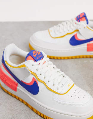 nike air force 1 shadow trainers in white red and blue