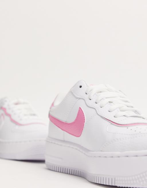 White nike air force with store pink tick