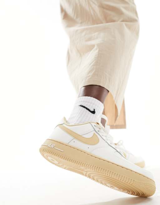 Nike Air Force 1 sneakers in off white and cacao brown