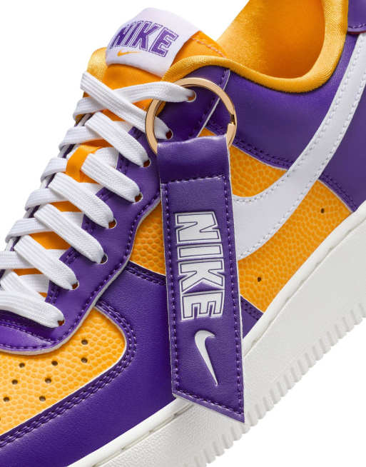 Nike Air Force 1 sneakers in purple and gold