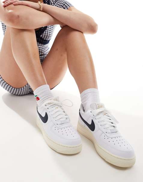 Nike Air Force 1 trainer in off white and navy - view 1