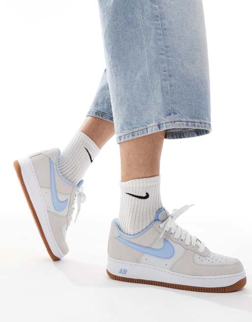 Nike Air Force 1 trainers in blue and grey