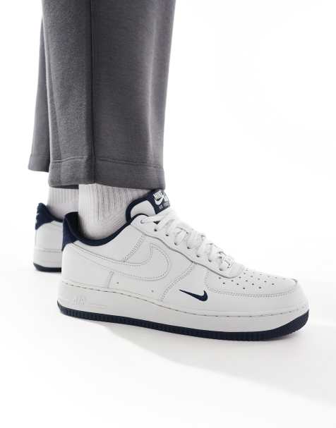Nike Air Force 1 trainers in white and blue - view 1