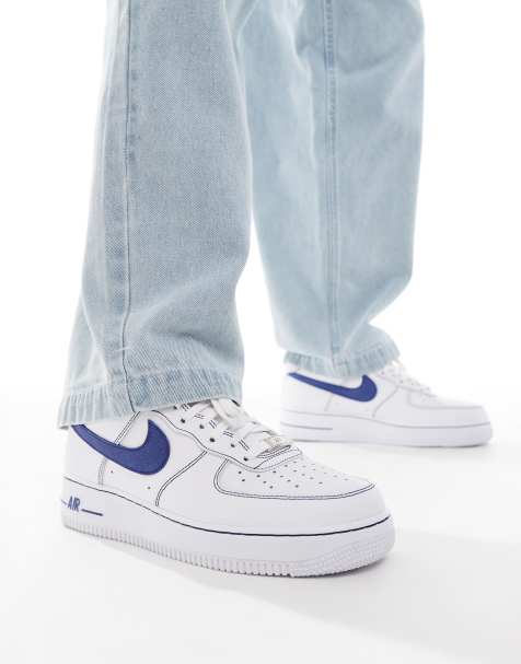 Nike Air Force 1 trainers in white and blue - view 1