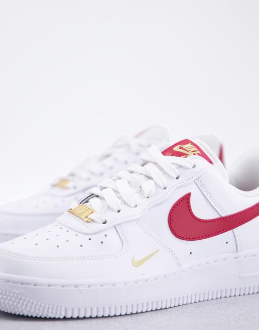 Nike Air Force 1 trainers in white and burgundy