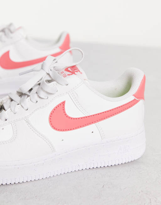 Nike Air Force 1 trainers in white and sea coral