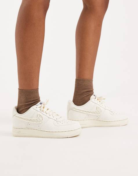 Nike Air Force 1 trainers with swoosh detail in off white  - view 1