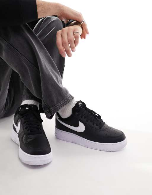 Nike Air Force 1 07 sneakers in black and white