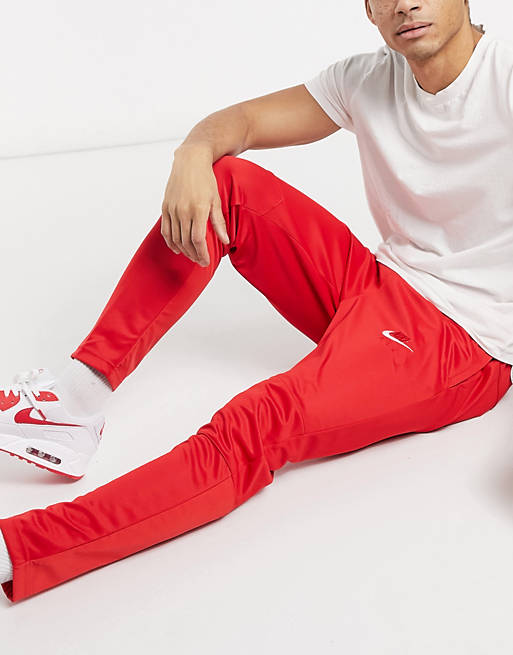 Specifiek Republikeinse partij keuken Nike - Air - Gebreide joggingbroek met geborduurd swoosh-logo in rood | ASOS