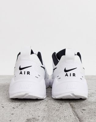 nike white trainers with black tick