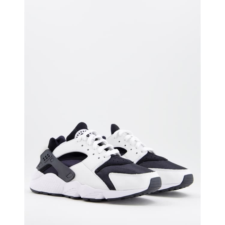 White huaraches sale with black logo