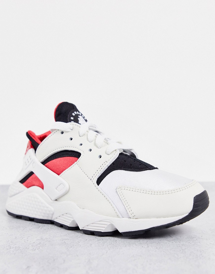 Nike Air Huarache sneakers in off white and red