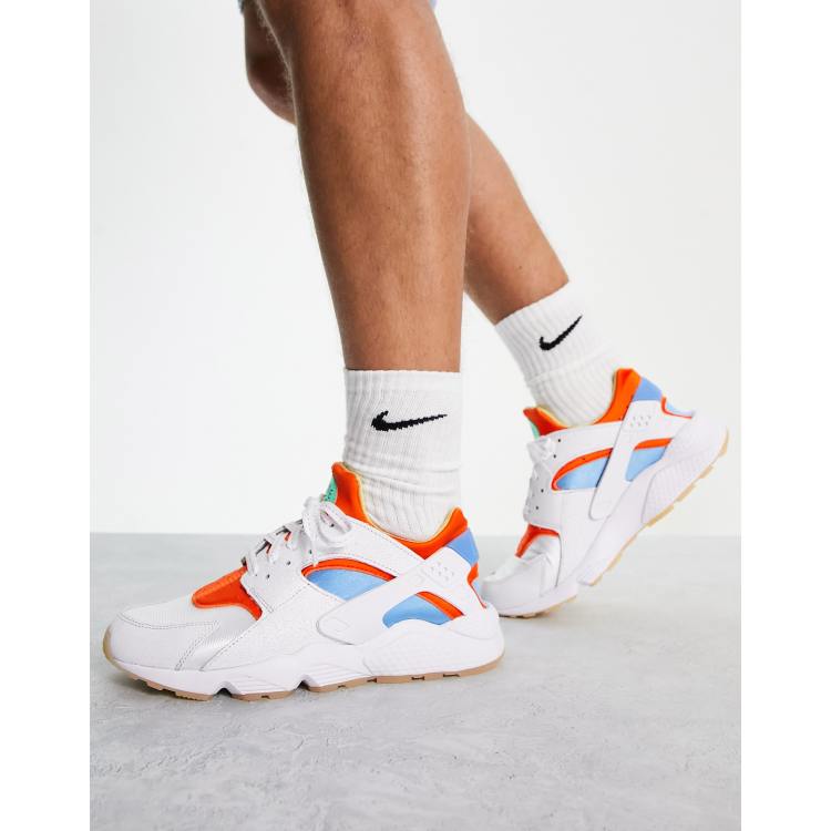 Nike Air Huarache sneakers in white orange and blue WHITE ASOS