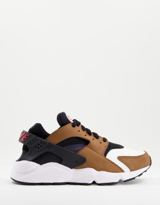 Nike Air Huarache trainers in black and brown