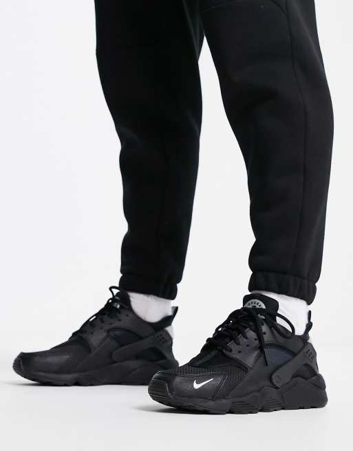 Nike Air Huarache trainers in black and metallic silver ASOS