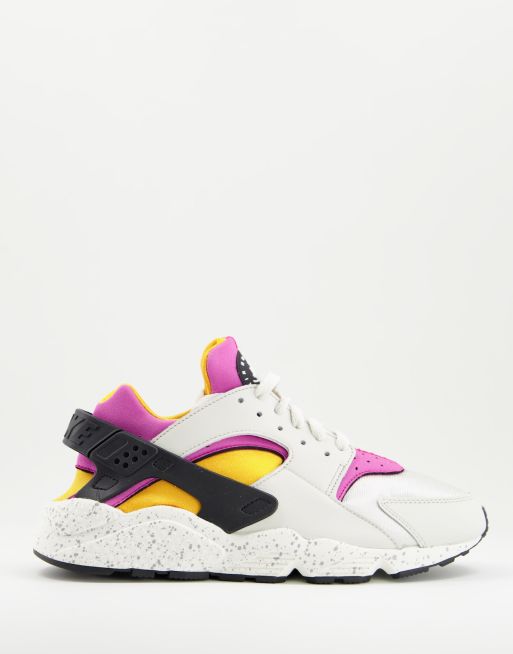 Nike Air Huarache trainers in off white and pink