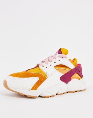 Nike Air Huarache trainers in sail cream and orange - ASOS Price Checker