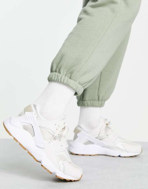 Nike Air Huarache trainers in white and fossil beige