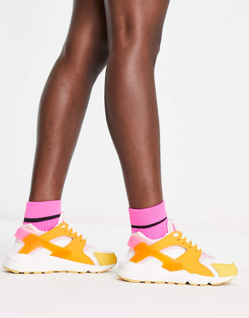 Nike huarache 2024 yellow pink