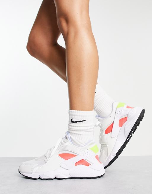 Nike Air Huarache trainers in white and neon