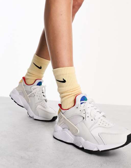 Nike Air Hurrache sneakers in white and gold ASOS