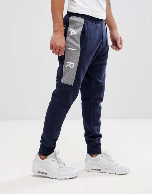 Nike air 2025 navy tracksuit