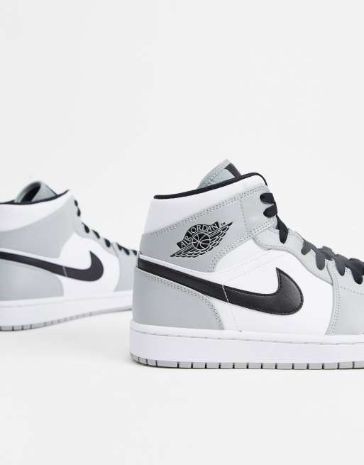 Nike Air Jordan 1 Baskets mi hautes Gris blanc