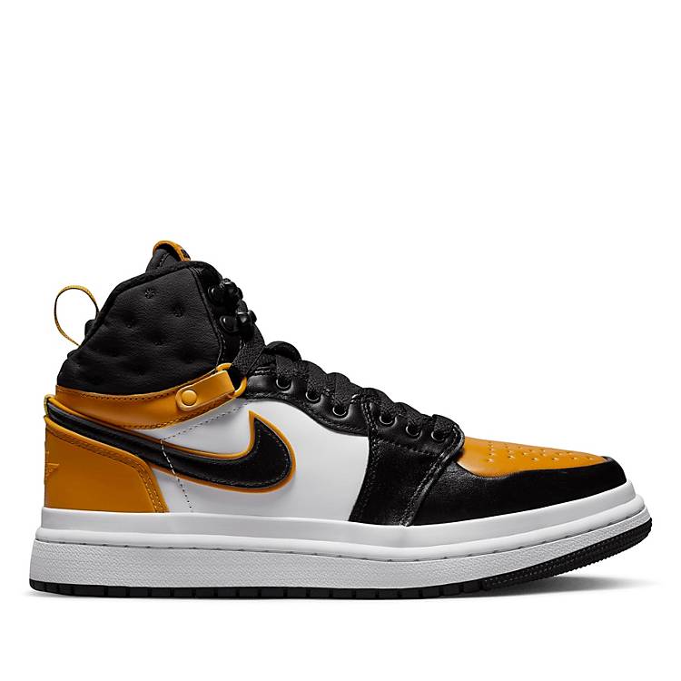 Taxpayer Picket Wink Nike Air Jordan 1 Elevate Mid sneakers in orange, black and white | ASOS