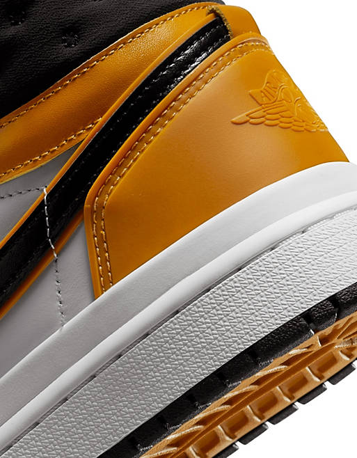 sugar concern carriage Nike Air Jordan 1 Elevate Mid sneakers in orange, black and white | ASOS
