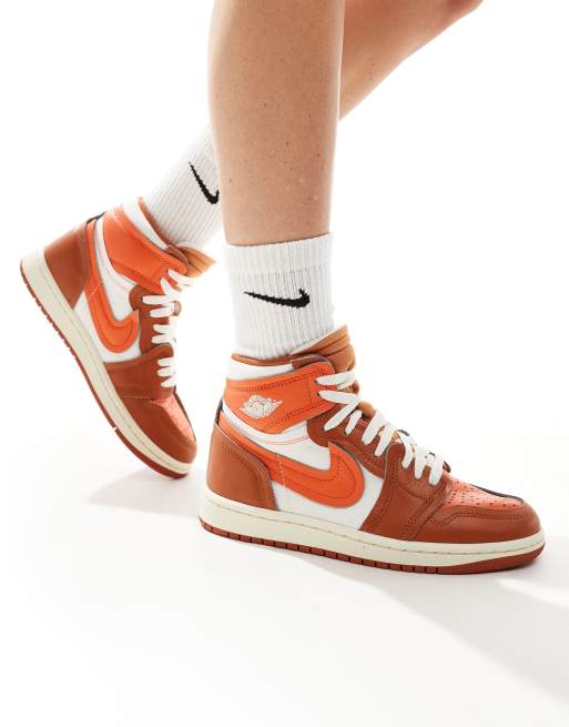 Nike Air Jordan 1 high sneakers in white and orange