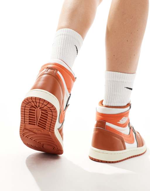 Nike Air Jordan high sneakers in white and orange ASOS