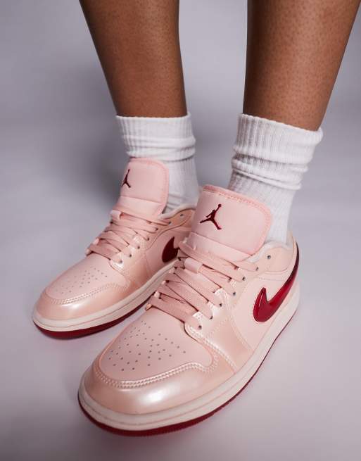 Nike Air Jordan Low sneakers in light orange and pink ASOS