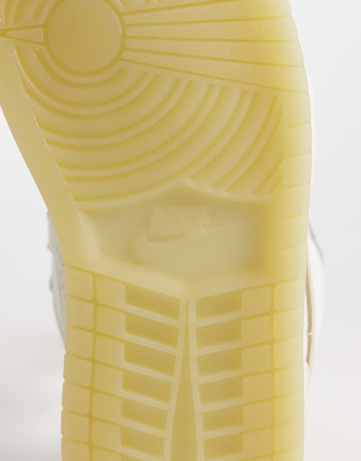 Nike Air Jordan 1 Low sneakers in off white and gold, 5 of 5