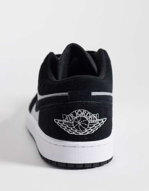 Nike Air Jordan 1 low trainers in black and grey, 2 of 5