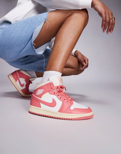 Nike Air Jordan 1 Mid sneakers in pink and white - view 1