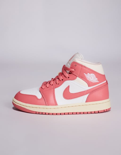 Nike Air Jordan 1 Mid sneakers in pink and white