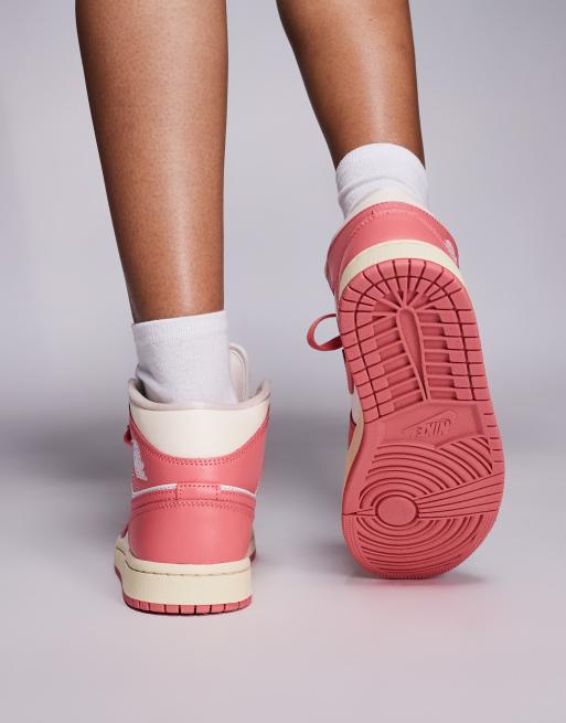Nike Air Jordan 1 Mid sneakers in pink and white