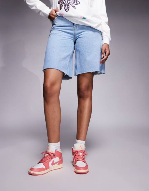 Nike Air Jordan 1 Mid sneakers in pink and white