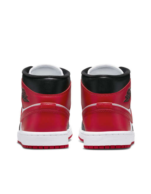 jugar Dónde misil Nike Air Jordan 1 Mid sneakers in red, black and white | ASOS