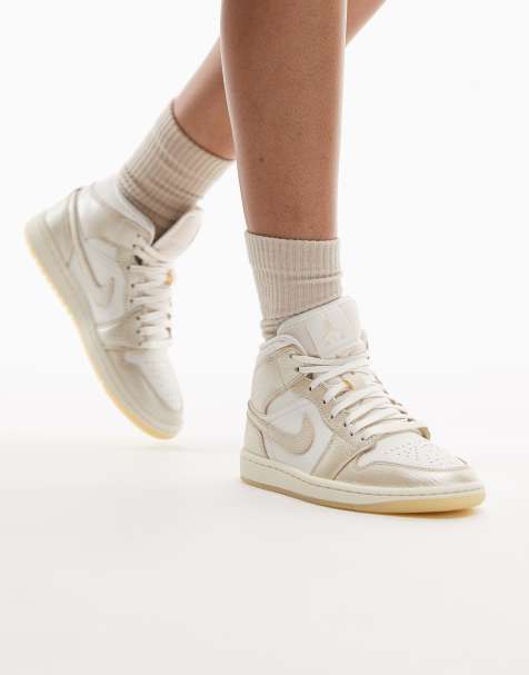 Nike Air Jordan 1 Mid sneakers in white and gold - view 1