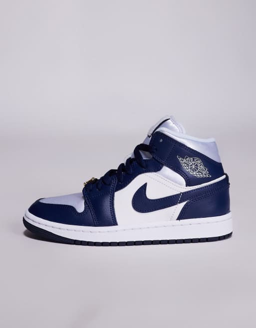 Nike Air Jordan ネイビー/ホワイト Nike Air Jordan 1 Mid sneakers in white and navy | ASOS
