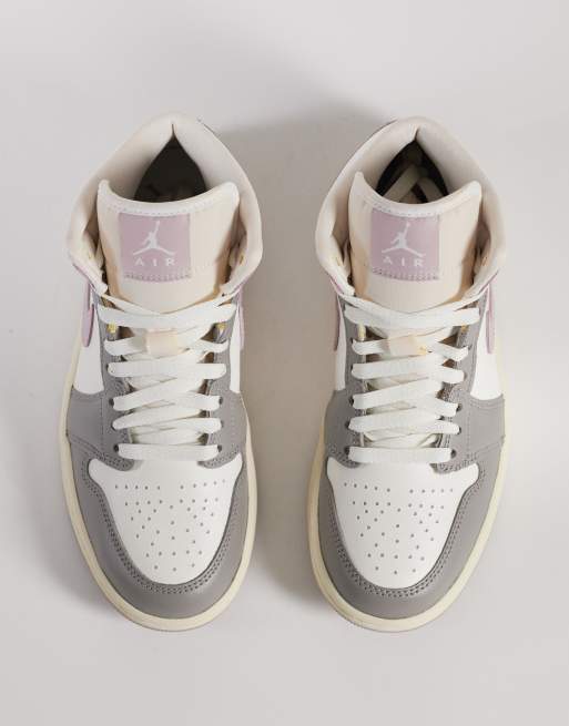 Jordan High-Top Sneakers in Light Gray with Peach Accents Nike Air Jordan 1 Mid sneakers in white, gray and baby pink  main image 4