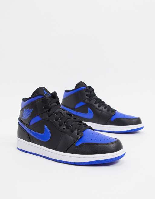 Nike Air Jordan 1 Mid trainers in blue and black