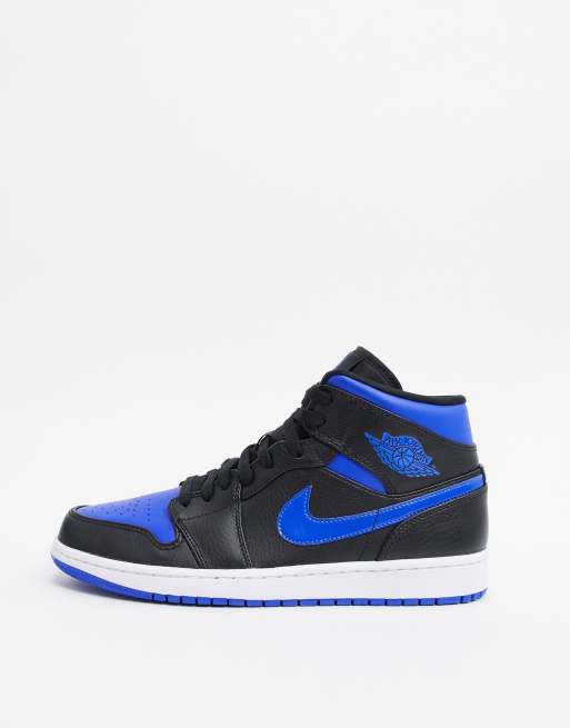 Nike Air Jordan 1 Mid trainers in blue and black